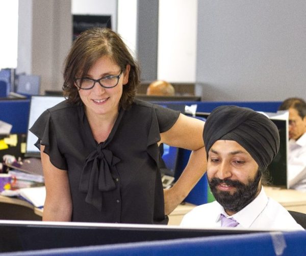 London Accountants looking at computer